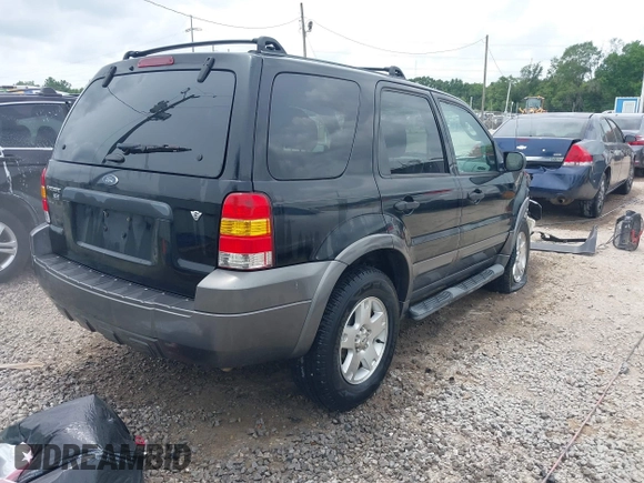 2006 Ford Escape XLT with VIN 1FMYU03156KA84031, listed as a IAAI auction lot 42276336 with 136,038 mi miles and . Bid and sale history available at DreamBid. Image 4.