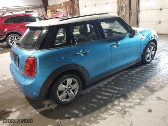 2018 MINI Hardtop 4 Door Cooper with VIN WMWXU1C51J2F80624, listed as a IAAI auction lot 41460317 with 81672 miles. Bid and sale history available at carsss.com. Image 4.
