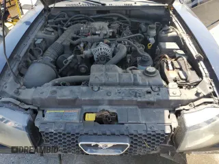 2002 Ford Mustang GT Deluxe z VIN 1FAFP45X22F101551, wystawiony jako Copart lot #55184645 z przebiegiem 137 971 mil mil oraz Szkoda całkowita • Salvage title. Historia ofert i sprzedaży dostępna na DreamBid. Obrazek 11.