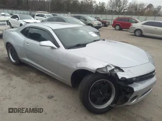 2013 Chevrolet Camaro LS с VIN 2G1FA1E3XD9211565, выставлен на аукционе IAAI как лот 34914144 с пробегом 184 936 миль миль и . История ставок и продаж доступна на DreamBid. Изображение 1.