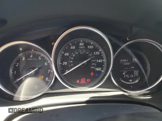 2014 Mazda CX-5 Touring z VIN JM3KE2CY7E0349484, wystawiony jako Copart lot #51188665 z przebiegiem 175 131 mil mil oraz Szkoda całkowita • Salvage title. Historia ofert i sprzedaży dostępna na DreamBid. Obrazek 9.
