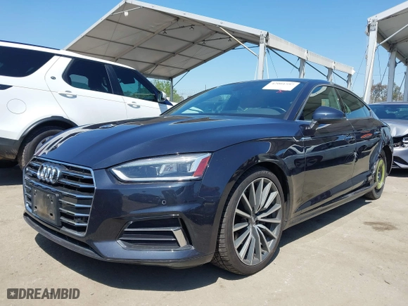 2018 Audi A5 Sportback Premium Plus with VIN WAUBNCF58JA119812, listed as a IAAI auction lot 42001597 with 55,396 mi miles. Bid and sale history available at carsss.com. Image 17.