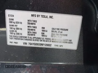 2024 Tesla Model Y Long Range z VIN 7SAYGDEE0RF128802, wystawiony jako IAAI lot #42128685 z przebiegiem 15 713 mil mil oraz . Historia ofert i sprzedaży dostępna na DreamBid. Obrazek 9.
