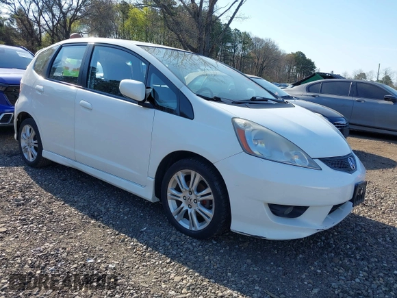 2009 Honda Fit Sport w/Navi with VIN JHMGE88609C002848, listed as a IAAI auction lot 42121403 with 168,138 mi miles. Bid and sale history available at carsss.com. Image 6.