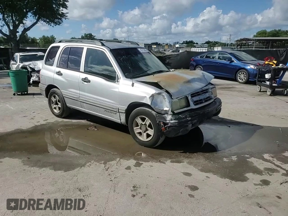 2003 Chevrolet Tracker with VIN 2CNBE13C836953178, listed as a Copart auction lot 60715605 with 128,978 mi miles and Salvage title. Bid and sale history available at DreamBid. Image 15.