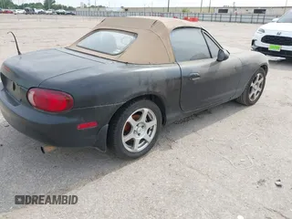 1999 Mazda MX-5 Miata with VIN JM1NB353XX0126008, listed as a IAAI auction lot 42435673 with 194,313 mi miles and . Bid and sale history available at DreamBid. Image 4.