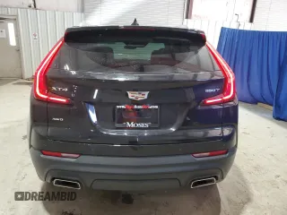 2021 Cadillac XT4 AWD Luxury with VIN 1GYFZBR42MF055788, listed as a Copart auction lot 46704275 with 23,516 mi miles and Clean Title. Bid and sale history available at carsss.com. Image 6.