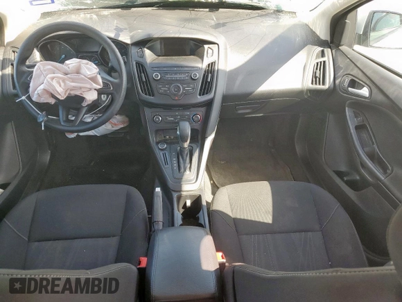 2018 Ford Focus SE z VIN 1FADP3F29JL225126, wystawiony jako Copart lot #52817265 z przebiegiem Nie podano mil oraz Szkoda całkowita • Salvage title. Historia ofert i sprzedaży dostępna na DreamBid. Obrazek 8.