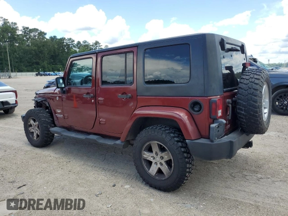 2007 Jeep Wrangler Unlimited Sahara with VIN 1J4GA591X7L118192, listed as a Copart auction lot 62357885 with 261,019 mi miles and Clean title. Bid and sale history available at DreamBid. Image 2.