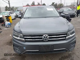 2018 Volkswagen Tiguan SEL z VIN 3VV3B7AX4JM005780, wystawiony jako IAAI lot #41880005 z przebiegiem 149 578 mil mil oraz . Historia ofert i sprzedaży dostępna na DreamBid. Obrazek 12.
