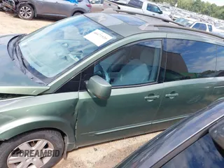 2004 Nissan Quest S with VIN 5N1BV28U44N363273, listed as a IAAI auction lot 40471920 with 192,009 mi miles. Bid and sale history available at carsss.com. Image 14.