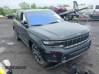 2023 Jeep Grand Cherokee Overland with VIN 1C4RJHDG2PC516797, listed as a IAAI auction lot 42026063 with 25,808 mi miles and . Bid and sale history available at DreamBid. Image 1.