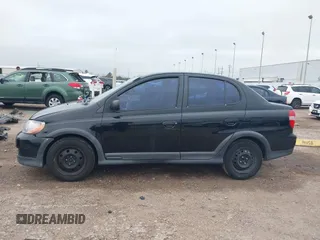 2000 Toyota ECHO z VIN JTDBT1231Y0098187, wystawiony jako IAAI lot #41611994 z przebiegiem 94 750 mil mil oraz . Historia ofert i sprzedaży dostępna na DreamBid. Obrazek 14.
