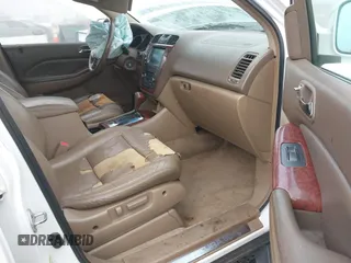 2004 Acura MDX Touring Pkg w/Navigation with VIN 2HNYD18874H545924, listed as a IAAI auction lot 41080740 with 343,574 mi miles. Bid and sale history available at carsss.com. Image 5.