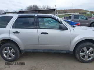 2012 Ford Escape XLT with VIN 1FMCU9DG1CKB76704, listed as a IAAI auction lot 41863525 with 176,104 mi miles and . Bid and sale history available at DreamBid. Image 13.