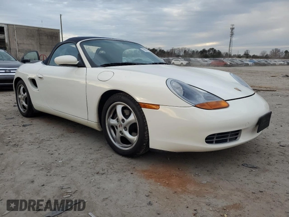 2000 Porsche Boxster z VIN WP0CA2980YU622861, wystawiony jako Copart lot #78993794 z przebiegiem 129 631 mil mil oraz Czysty tytuł • Clean title. Historia ofert i sprzedaży dostępna na DreamBid. Obrazek 4.