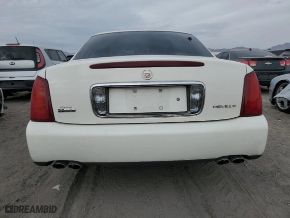 2004 Cadillac DeVille with VIN 1G6KD54Y44U116247, listed as a Copart auction lot 42231575 with 98,660 mi miles and Salvage Title. Bid and sale history available at carsss.com. Image 6.