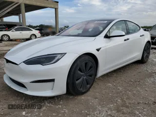 2024 Tesla Model S с VIN 5YJSA1E56RF543139, выставлен на аукционе Copart как лот 86568584 с пробегом 1 212 миль миль и Списание • Salvage title. История ставок и продаж доступна на DreamBid. Изображение 1.