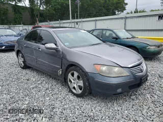 2005 Acura RL z VIN JH4KB16575C013649, wystawiony jako Copart lot #61172125 z przebiegiem 140 503 mil mil oraz Czysty tytuł • Clean title. Historia ofert i sprzedaży dostępna na DreamBid. Obrazek 4.