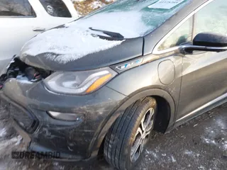 2021 Chevrolet Bolt EV Premier z VIN 1G1FZ6S09M4113694, wystawiony jako IAAI lot #41378289 z przebiegiem 40 979 mil mil oraz . Historia ofert i sprzedaży dostępna na DreamBid. Obrazek 12.
