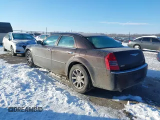 2005 Chrysler 300 with VIN 2C3AA63H65H526016, listed as a IAAI auction lot 41296420 with 136,794 mi miles. Bid and sale history available at carsss.com. Image 3.