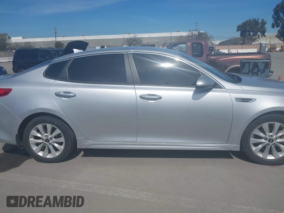 2018 Kia Optima LX with VIN 5XXGT4L31JG267716, listed as a IAAI auction lot 41890611 with 63,491 mi miles and . Bid and sale history available at carsss.com. Image 13.