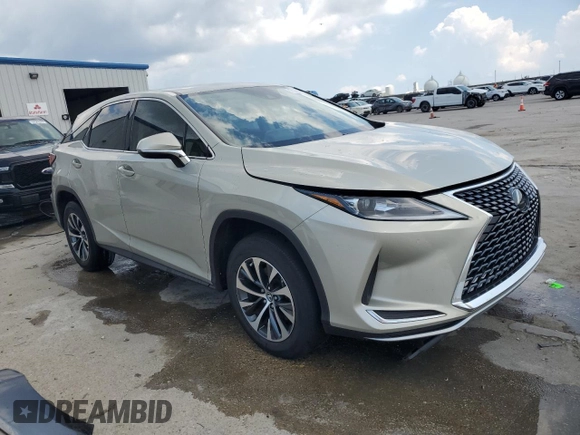 2020 Lexus RX with VIN 2T2AZMAA6LC168904, listed as a Copart auction lot 71385114 with 63,184 mi miles and Salvage Title. Bid and sale history available at carsss.com. Image 4.