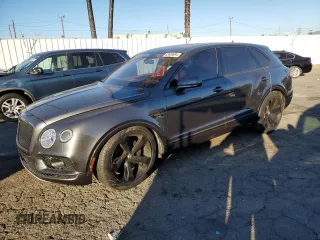 2018 Bentley Bentayga Signature z VIN SJAAC2ZV7JC019555, wystawiony jako Copart lot #83639694 z przebiegiem 50 323 mil mil oraz Szkody całkowita. Historia ofert i sprzedaży dostępna na DreamBid. Obrazek 1.