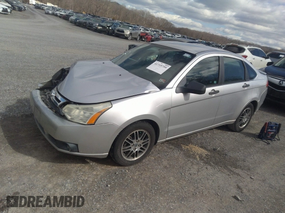 2011 Ford Focus SE with VIN 1FAHP3FN5BW129246, listed as a IAAI auction lot 41719759 with 144,867 mi miles and . Bid and sale history available at DreamBid. Image 2.