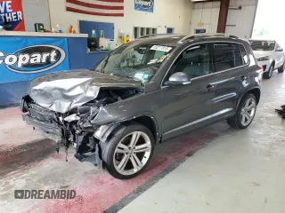 2016 Volkswagen Tiguan SE с VIN WVGBV7AXXGW036456, выставлен на аукционе Copart как лот 65217815 с пробегом 75 084 миль миль и Списание • Salvage title. История ставок и продаж доступна на DreamBid. Изображение 1.