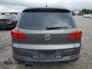 2013 Volkswagen Tiguan S z VIN WVGAV3AX6DW597379, wystawiony jako Copart lot #56386515 z przebiegiem 100 415 mil mil oraz Czysty tytuł • Clean title. Historia ofert i sprzedaży dostępna na DreamBid. Obrazek 6.
