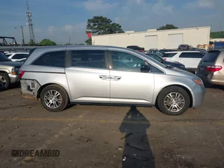 2013 Honda Odyssey EX-L with VIN 5FNRL5H6XDB084016, listed as a IAAI auction lot 42044300 with 156,296 mi miles and . Bid and sale history available at carsss.com. Image 13.