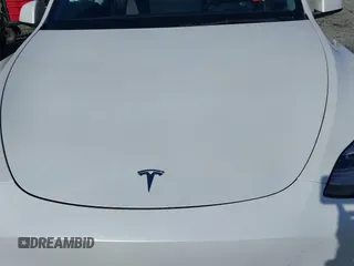 2021 Tesla Model Y Standard Range with VIN 5YJYGDED9MF110697, listed as a IAAI auction lot 41707730 with Not Provided miles and . Bid and sale history available at carsss.com. Image 10.