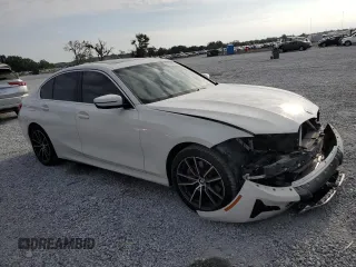 2020 BMW 3 Series 330i with VIN WBA5R1C0XLFH39262, listed as a Copart auction lot 57398585 with 55,456 mi miles and Salvage title. Bid and sale history available at DreamBid. Image 4.