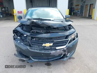 2014 Chevrolet Impala LS with VIN 1G11X5SL0EU164667, listed as a IAAI auction lot 42542110 with 150,458 mi miles and . Bid and sale history available at DreamBid. Image 12.