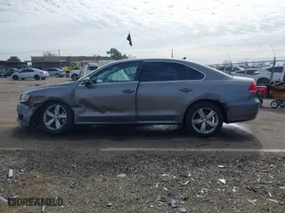 2012 Volkswagen Passat SE with VIN 1VWBP7A35CC024137, listed as a IAAI auction lot 41572782 with 138,827 mi miles. Bid and sale history available at carsss.com. Image 14.