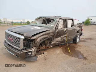 2015 GMC Sierra 1500 Denali z VIN 3GTU2WEJ6FG174160, wystawiony jako IAAI lot #40118246 z przebiegiem Nie podano mil oraz . Historia ofert i sprzedaży dostępna na DreamBid. Obrazek 2.