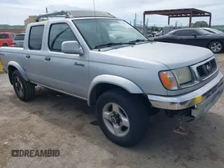 2000 Nissan Frontier XE z VIN 1N6ED27Y3YC431828, wystawiony jako IAAI lot #41858717 z przebiegiem 322 378 mil mil oraz . Historia ofert i sprzedaży dostępna na DreamBid. Obrazek 1.