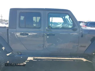 2020 Jeep Gladiator Sport S with VIN 1C6JJTAG6LL190749, listed as a IAAI auction lot 41401209 with 97,292 mi miles and . Bid and sale history available at DreamBid. Image 13.