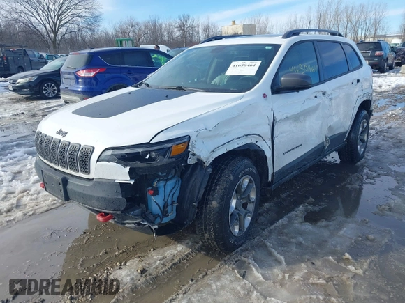 2019 Jeep Cherokee Trailhawk Elite with VIN 1C4PJMBX0KD315275, listed as a IAAI auction lot 41630464 with 94,558 mi miles. Bid and sale history available at carsss.com. Image 2.