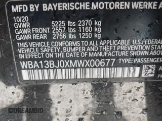 2021 BMW 5 Series 530i xDrive with VIN WBA13BJ0XMWX00677, listed as a IAAI auction lot 42100435 with 66,140 mi miles and . Bid and sale history available at DreamBid. Image 9.
