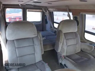 1999 Ford Econoline Cargo z VIN 1FDRE14W1XHA24974, wystawiony jako IAAI lot #42394228 z przebiegiem 138 473 mil mil oraz . Historia ofert i sprzedaży dostępna na DreamBid. Obrazek 8.