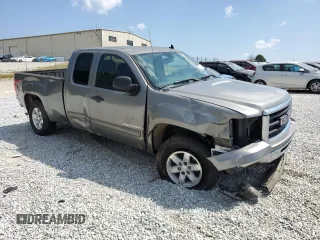 2009 GMC Sierra 1500 SLE with VIN 1GTEK29099Z115302, listed as a Copart auction lot 69263134 with 140,903 mi miles and Salvage Title. Bid and sale history available at carsss.com. Image 4.