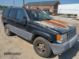 1996 Jeep Grand Cherokee Laredo with VIN 1J4GZ58SXTC280868, listed as a IAAI auction lot 42653608 with 188,867 mi miles and . Bid and sale history available at DreamBid. Image 1.