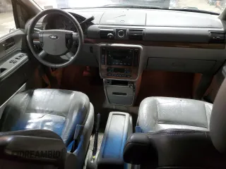 2004 Ford Freestar Limited z VIN 2FMDA58254BA54752, wystawiony jako Copart lot #89195235 z przebiegiem Nie podano mil oraz Szkoda całkowita • Salvage title. Historia ofert i sprzedaży dostępna na DreamBid. Obrazek 8.