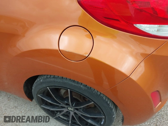 2013 Hyundai Veloster RE:MIX with VIN KMHTC6AD5DU106088, listed as a IAAI auction lot 41904678 with 213,478 mi miles and . Bid and sale history available at DreamBid. Image 6.