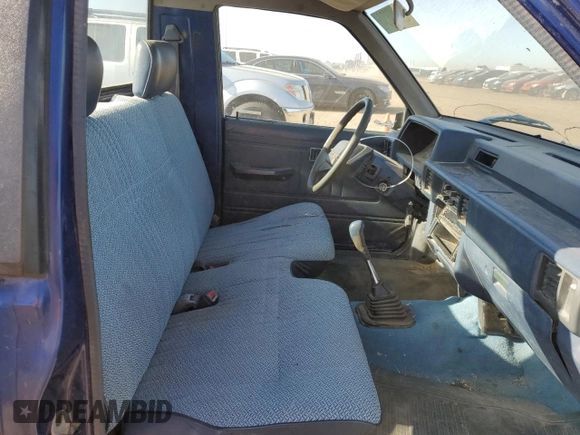 1994 Mitsubishi Mighty Max z VIN JA7LS21G4RP009588, wystawiony jako Copart lot #60519834 z przebiegiem 123 918 mil mil oraz Szkoda całkowita • Salvage title. Historia ofert i sprzedaży dostępna na DreamBid. Obrazek 10.