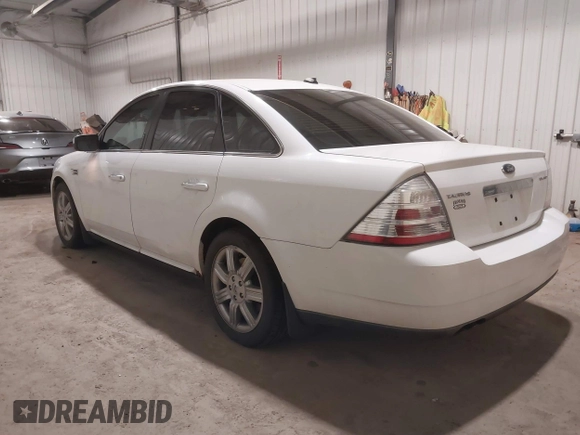 2008 Ford Taurus Limited with VIN 1FAHP25W28G173633, listed as a IAAI auction lot 40994885 with 133,974 mi miles. Bid and sale history available at carsss.com. Image 3.
