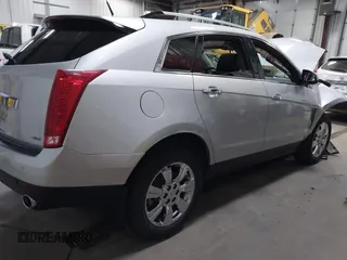 2014 Cadillac SRX Luxury Collection z VIN 3GYFNEE36ES679505, wystawiony jako IAAI lot #41817608 z przebiegiem 62 351 mil mil oraz . Historia ofert i sprzedaży dostępna na DreamBid. Obrazek 4.