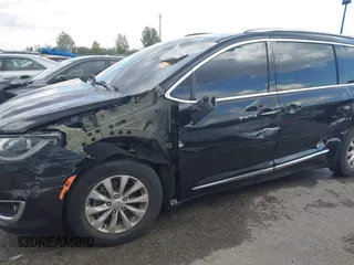 2018 Chrysler Pacifica Touring L with VIN 2C4RC1BG9JR120790, listed as a IAAI auction lot 41998460 with 124,146 mi miles and . Bid and sale history available at DreamBid. Image 6.
